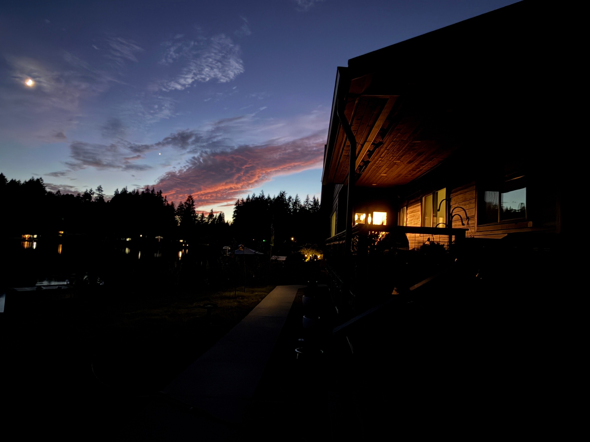 Sunset over a PNW waterfront home listing